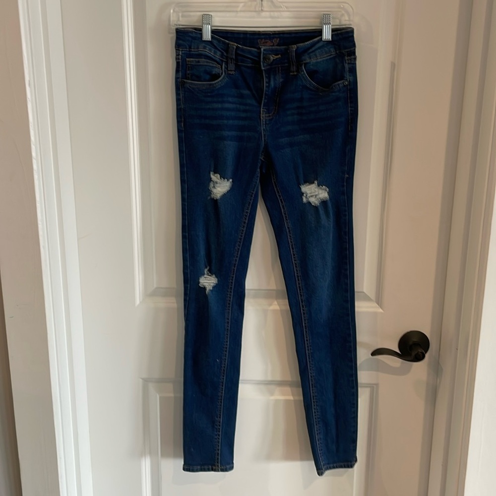 Girls ripped skinny jeans